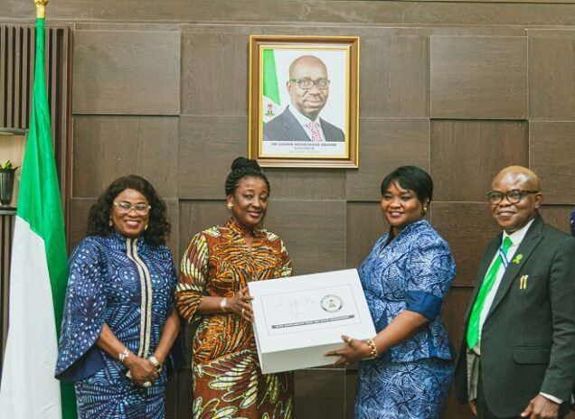 Team Lead, USAid, Dolapo Ogundehin (2nd right); Mrs. Betsy Obaseki (2nd left) exchanging gift
