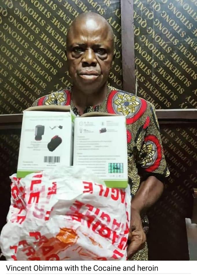 Vincent Obimma with cocaine in light torches