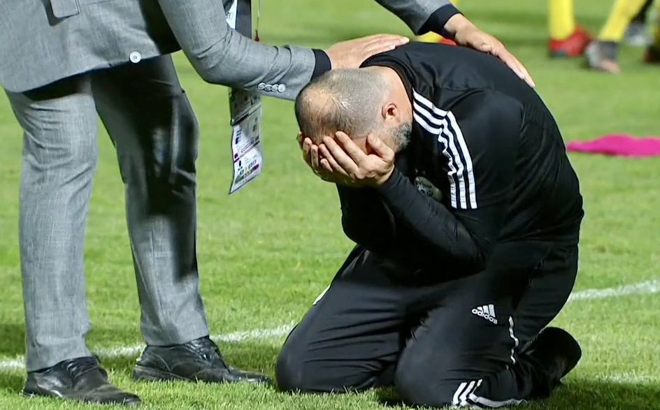 Algerian coach Djamel Belmadi weeps