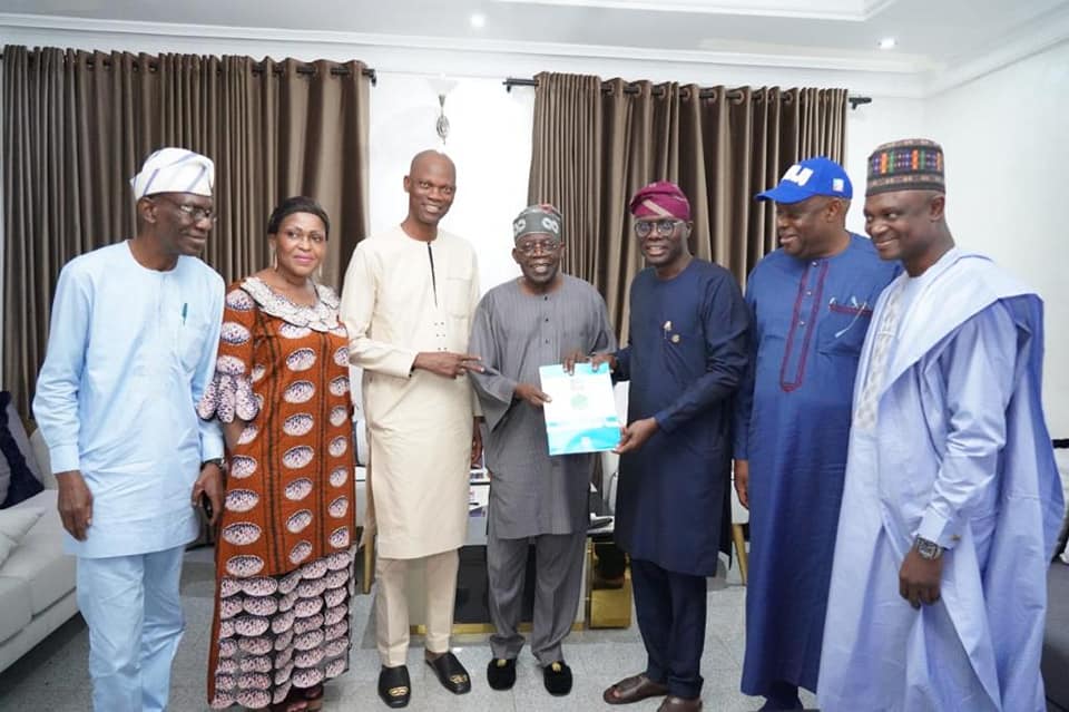 The former Lagos governor with his presidential form and others