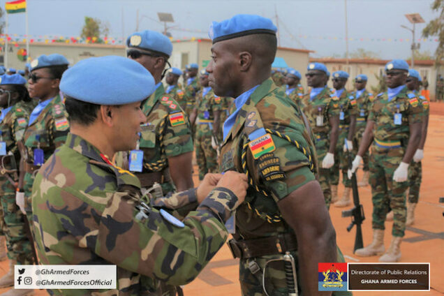 A Ghanaian soldier being decorated with UN medal