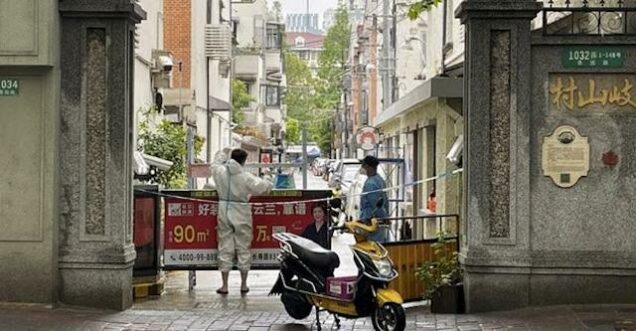 China erects fence barriers in Shanghai residential areas