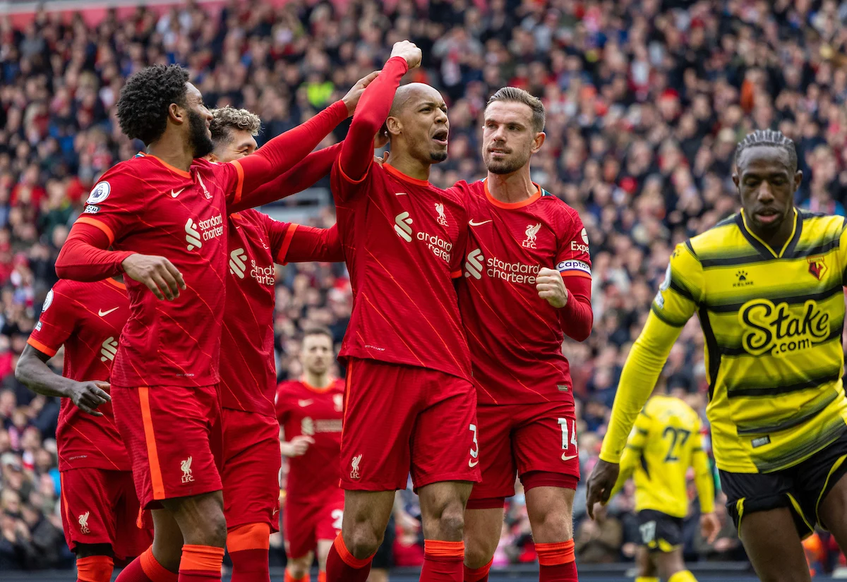 Liverpool players celebrate victory over Watford