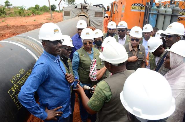 Mele Kyari, left with NNPC board members inspects AKK gas pipeline