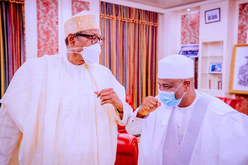 Buhari with Sokoto Governor during the visit