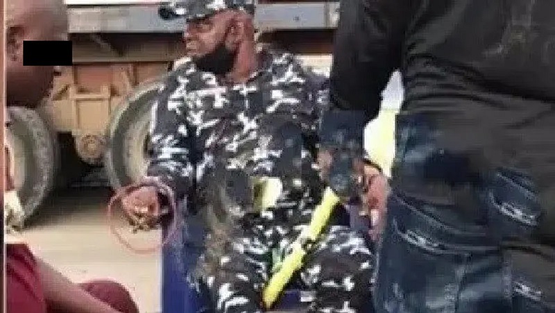 ASP Babatunde Adebayo: caught in a video while smoking Indian hemp.