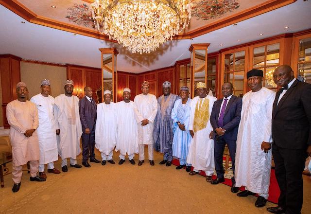 Buhari in Aso Rock with aides after the Eid prayer