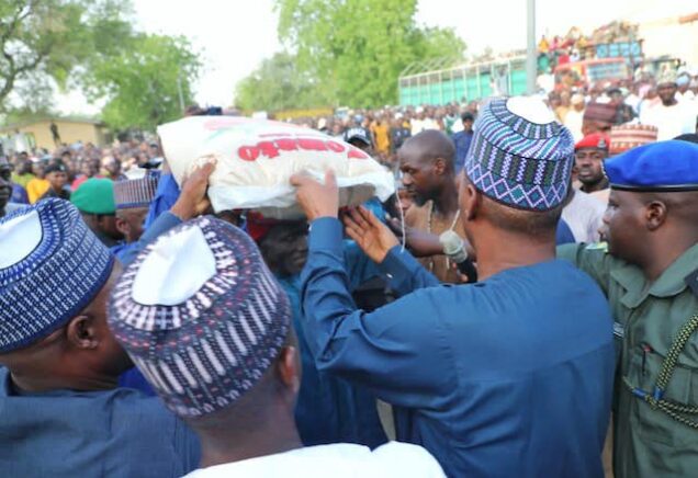 File: Governor Zulum, second right, gives palliatives to Borno people