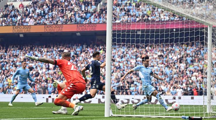 Gundogan gives City the title.