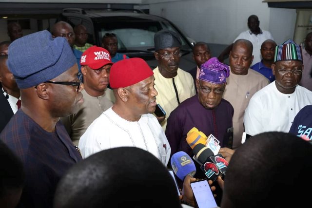 Wike addressing newsmen. With him are Obasanjo, Makinde and Ortom