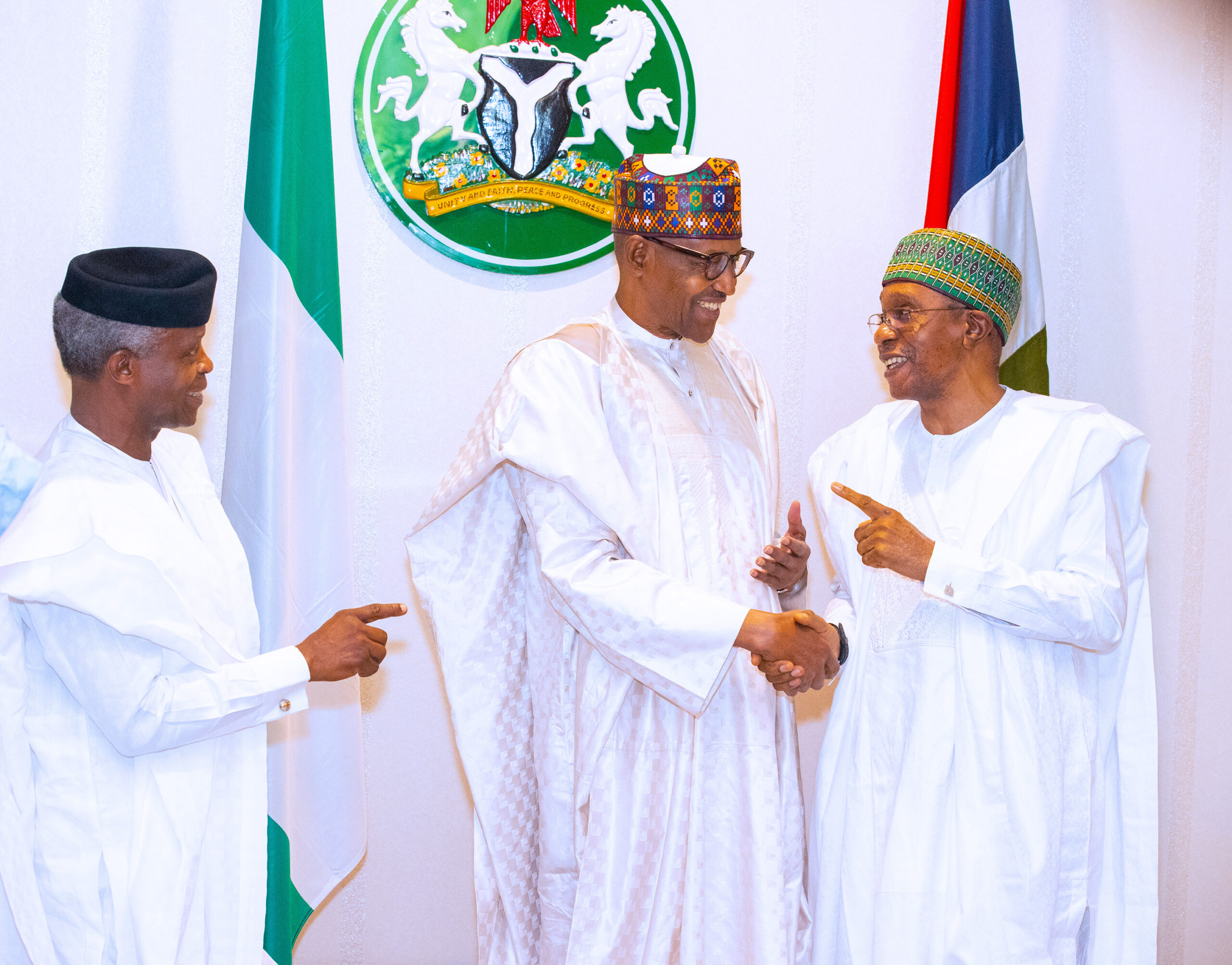 The president with Osinbajo and Emefiele 