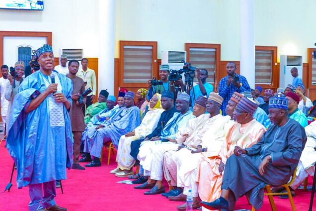 Presidential Aspirant of APC,  Rotimi Amaechi, addressing leaders and delegates of the party in Yobe State during a consultative meeting at the Government House Damaturu, Monday. Sitting fourth from right on first row is Tukur Buratai