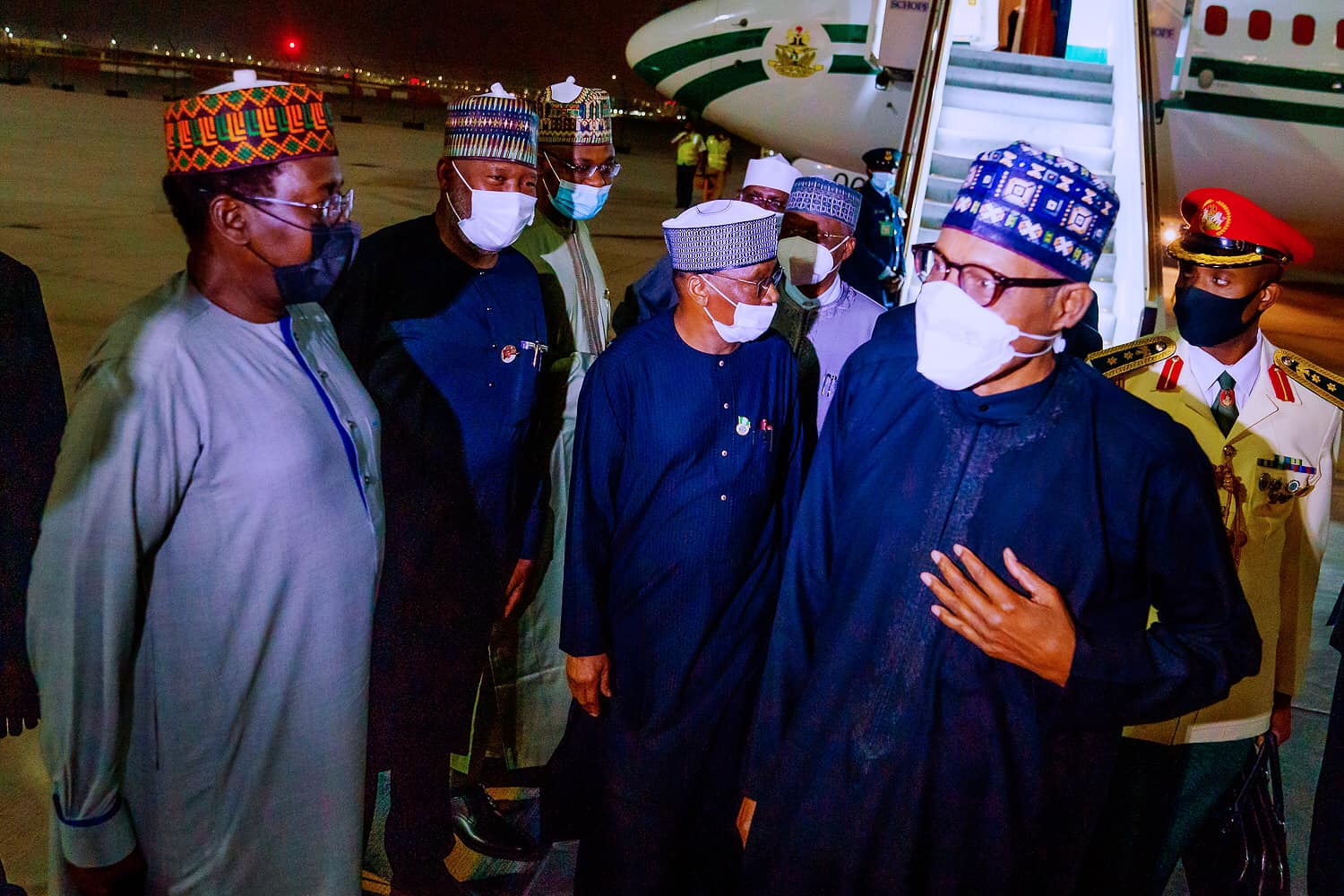 Buhari with his entourage