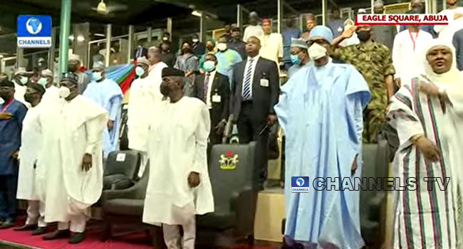 Buhari and his wife, Aisha, with Osinbajo at the venue of APC Special Convention