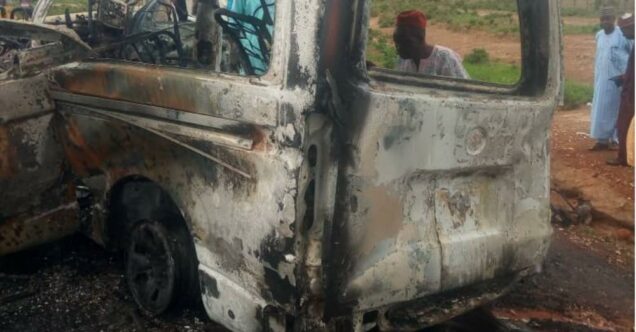 A burnt bus after an accident