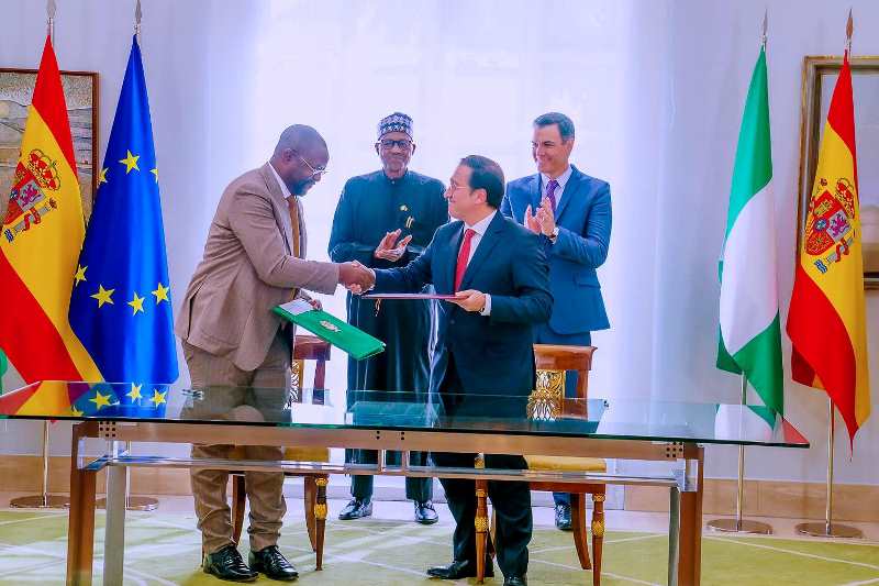 Sunday Dare with his Spanish counterpart after signing MoU