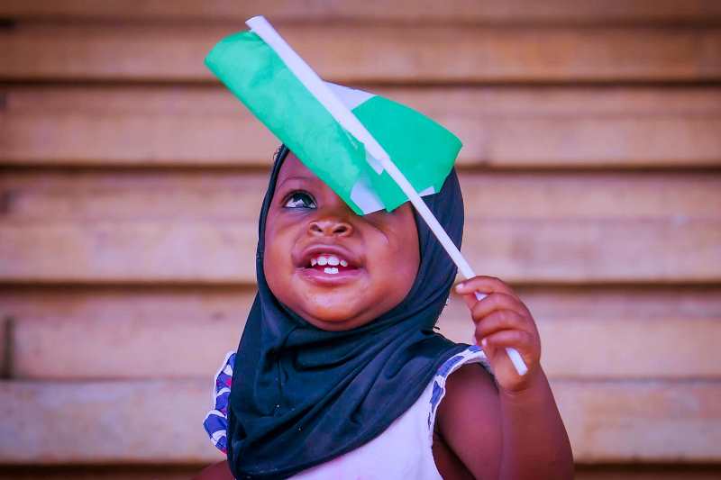 A child with Nigerian flag