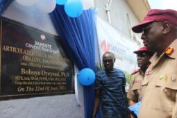 Dr. Boboye Olayemi Oyeyemi, FRSC Corps Marshal, right, and others, during the opening of the school-1