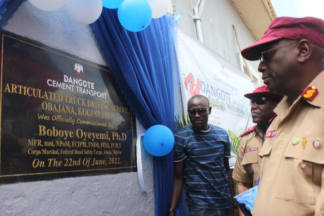 Dr. Boboye Olayemi Oyeyemi, FRSC Corps Marshal, right, and others, during the opening of the school
