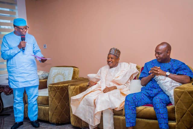 Fayemi with the election result as Bagudu and Oyebanji look on
