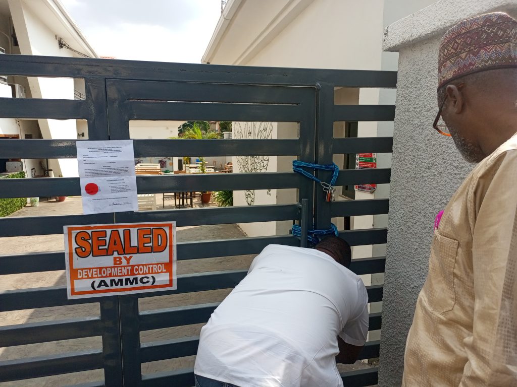 Federal Capital Territory Administration (FCTA) officials sealing off Zodara Bar Abuja