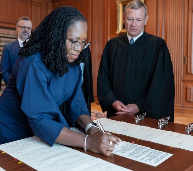 Justice Ketanji Jackson signs the oath