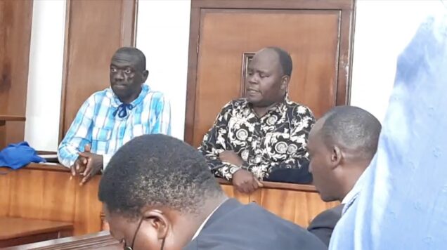 Kizza Besigye in court with Samuel Mukaku Lubega