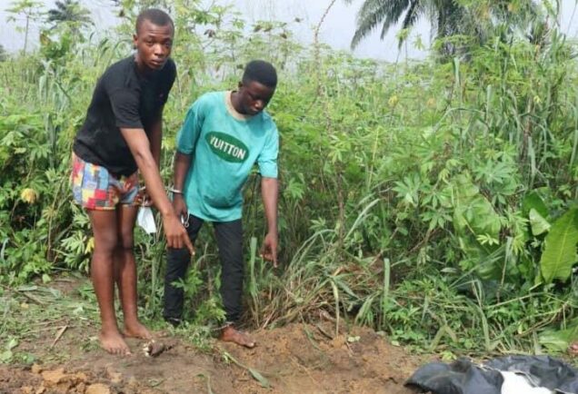 18 year old leader of Rivers kidnap gang, Ubong Emmanuel and a member of his gang: showing the shallow grave they allegedly bury abducted David Onyems