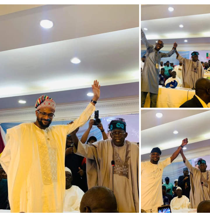 Tinubu raising the hands of APC candidates for various   positions