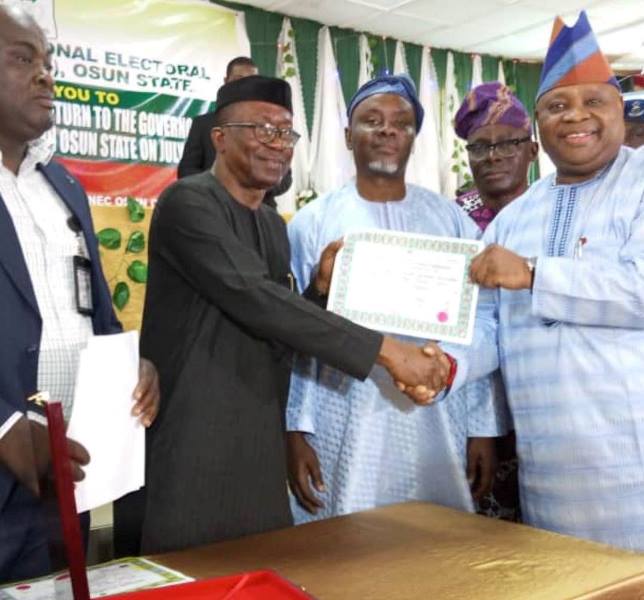 Ademola receives certificate of return from INEC