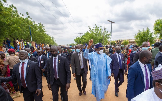 Buhari on his way home after the Eid-el-Kabir prayer