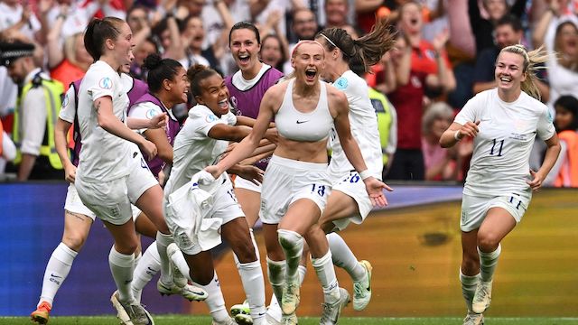 Chloe Kelly celebrates scoring England's second and winning goal