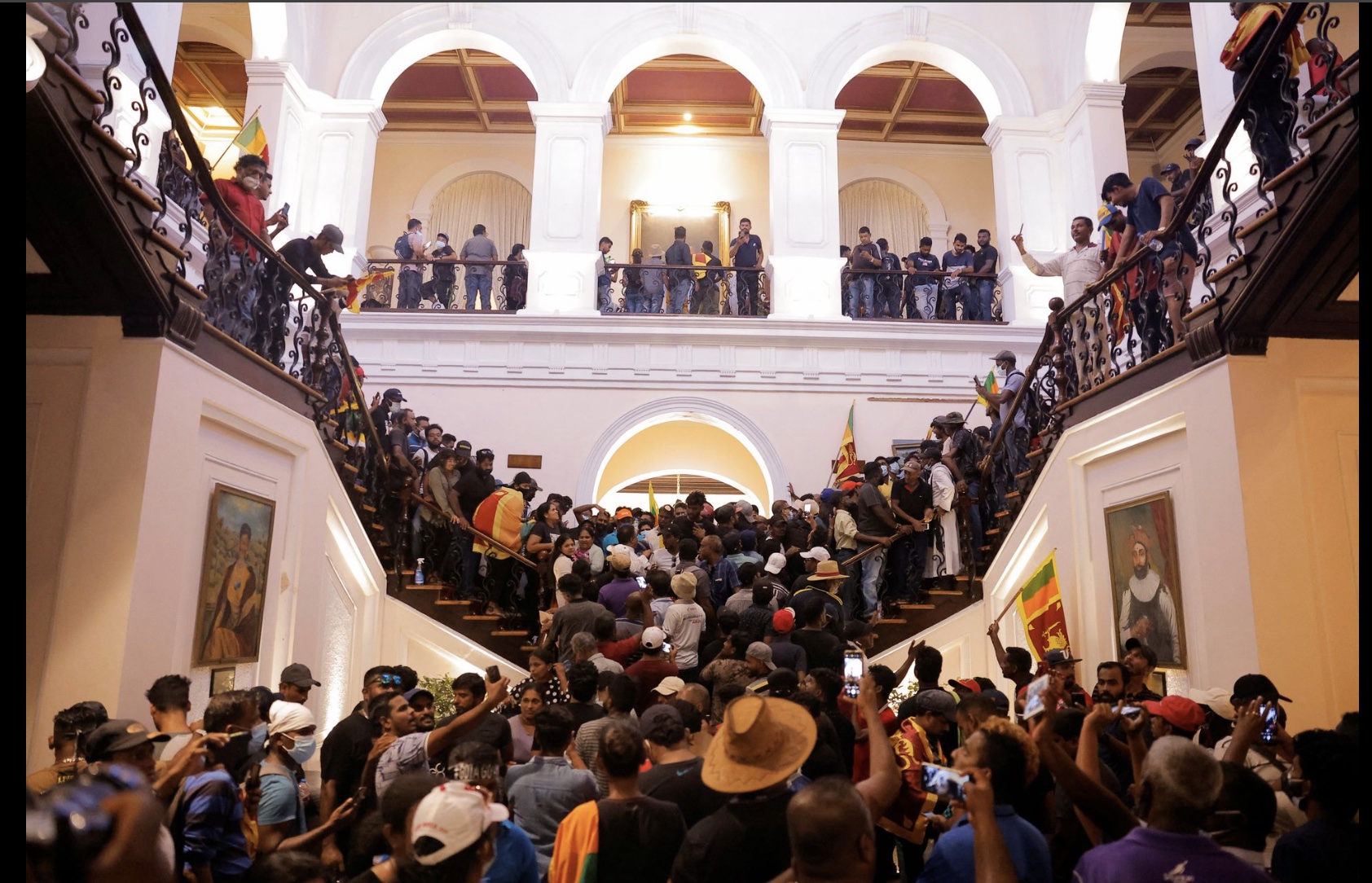 Demonstrators inside the mansion of President Rajapaksa