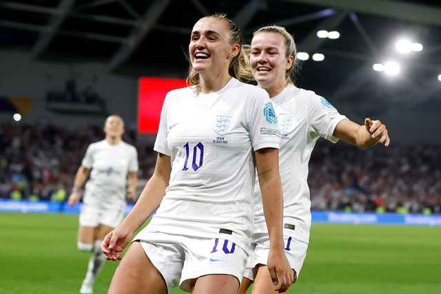 Stanway celebrates her goal with team mate.