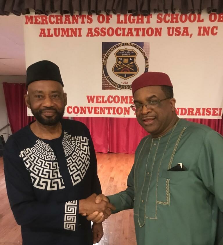 Left- Mr Henry Mbonu , outgoing President, Merchants of Light School Oba Alumni Association U.S.A., welcomes the new President, Dr Somto Ubezonu, at the association’s 2022 Annual Convention in Hillside, New Jersey, U.S.A. on Saturday.