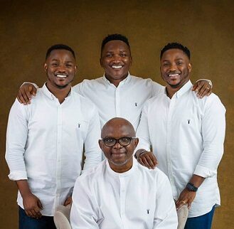 Mike Awoyinfa and his sons