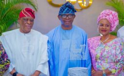 Mr and Mrs Mike Awoyinfa with Chief Olusegun Osoba during the cutting of the cake