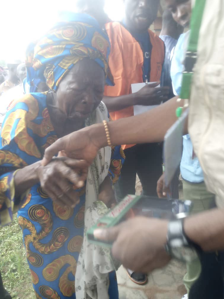 The nonagenarian being assisted