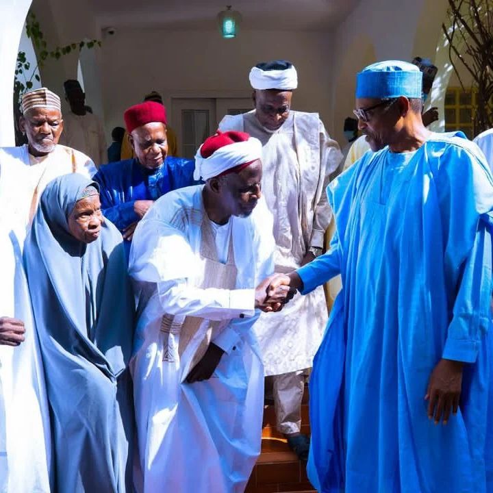 President Buhari shares emotional moment with classmates