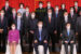 Steven Ho in yellow box, in a photo-op with Xi Jinping, first row middle.