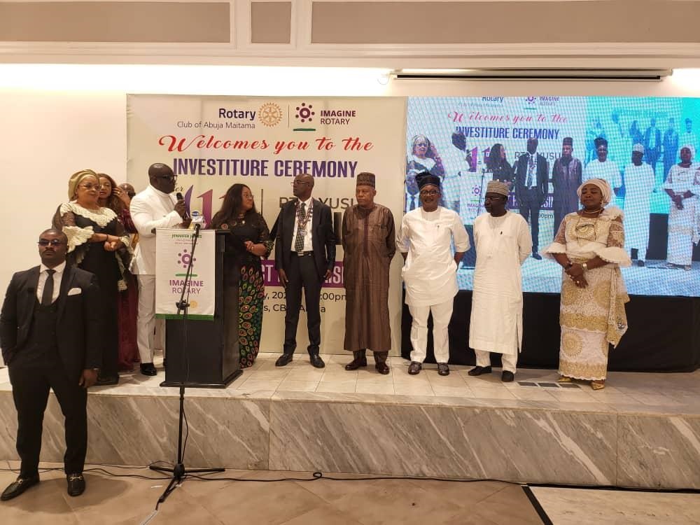 4th from right: Ex- Borno governor, Kashim Shettima, Chairman of the investiture ceremony of the Managing Editor Northern Operation of The Nation Newspaper and Rotarian Yusuf Alli 5th from right) as the 11th President of the Rotary Club of Abuja Maitama, in Abuja and other dignitaries at the event