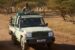 a military vehicle patrols rural Burkina Faso