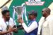 Rivers State governor, Nyesom Ezenwo Wike (middle); Minister of Youths and Sports, Sunday Dare (right) and the Captain Rivers United, Festus Austin receiving the 2021/2022 Nigeria Professional Football League trophy from Governor Wike at the Adokiye Amiesimaka Stadium, Port Harcourt on Sunday.