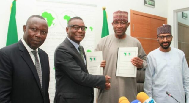 AFDB 5 L-R, Director General Securities and Exchange Commission Mr Lamido Yuguda Director General , African Development Bank Group Mr Lamin Barrow, and Executive Commissioner Corporate Services SEC Mr Ibrahim Boyi during the Signing of MOU between The SEC and AFDB on Nigeria Securities Market Surveillance System Project in Abuja