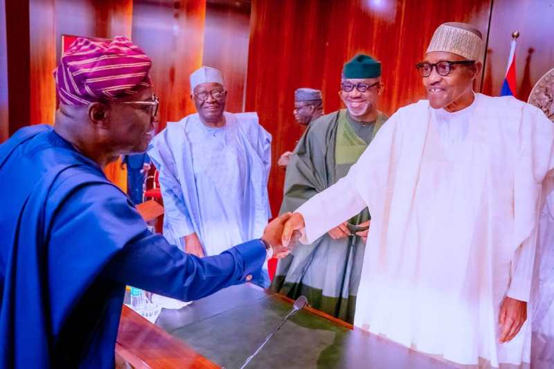 The president shook hand with Sanwo-Olu in Abuja during the visit