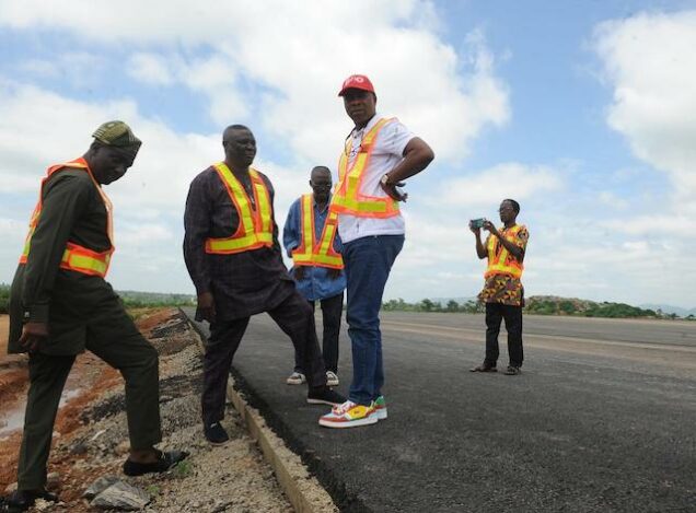 An inspection team checks the runway of the Ekiti airport