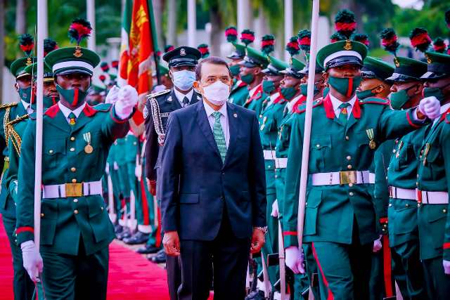 Ambassador of Mexico to Nigeria H.E. Mr. Juan Alfred Miranda Oritz inspecting guard of honour