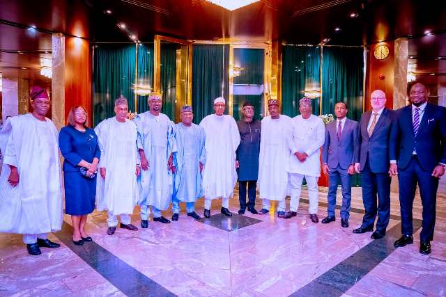 Buhari with BUA chairman, others during the visit
