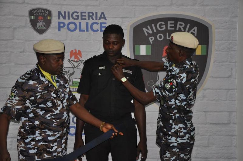 Corporal Opeyemi Kadiri, middle,