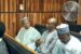 Ex-AGF Ahmed Idris, left, with other accused in court